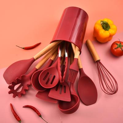 China Sustainable Custom Factory 12 Pieces Wooden Handle Baking Cooking Tools Silicone Kitchenware Set for sale