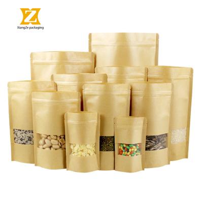 China Oil And Rust Proof Factory Custom Zipper Stand Up Food Packaging Kraft Paper Flour Bags With Window for sale