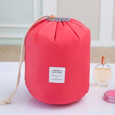 China Portable / Waterproof / Eco-friendly / Anti-theft / Soft / Insulated Barrel shaped travel bag  round drawstring cosmetic drawstring bag hot selling gift bag for sale