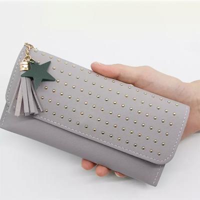 China Waterproof Fashionable ladies wallets and purses women rivet leather wallet women for sale