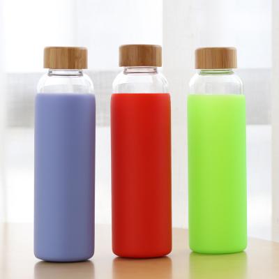 China Amazon Hot Sale 550ml Stocked Drinking Glass Tumbler With Silicone Sleeve Reusable Insulated Glass Bottle for sale