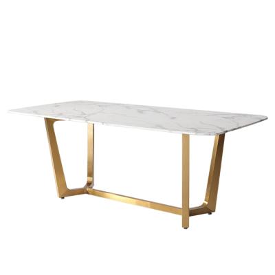 China Modern hot sale gold brushed stainless steel base artificial marble top dining table for dining room for sale