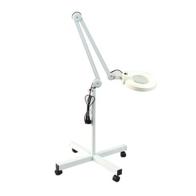 China Hospital Adjustable Arm Swivel Base Rolling Wheel Stand 4 Floor Magnifying Lamps for sale