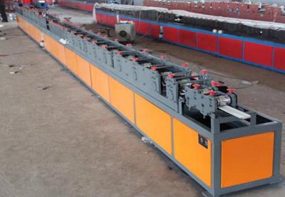 China 4KW Fire - Proof Shutter Door Roll Forming Machine with Colored Steel In 8-12m/min for sale