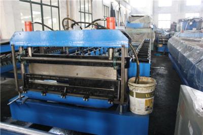 China Hydraulic Cutting Roll Shutter Door Frame Roll Forming Machine with Holes Punching for sale