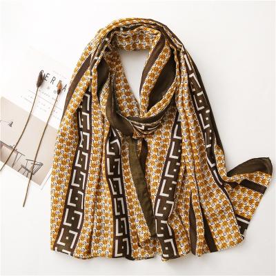 China Canvas Geometric Letter Feeling Soft Smooth Cotton New Printed Designer Inspired Fashion Shawl 2021 New Cotton Squishy Scarf for sale