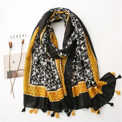 China 2021 Autumn/Winter New Women's Tassel Shawl Black Fashionable Hot Unique Wave Dot Shawl Scarf for sale