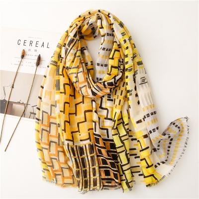 China 2021 soft soft feeling fashion yellow check printed shawl scarf women cotton tassel scarf European vintage style scarf for sale