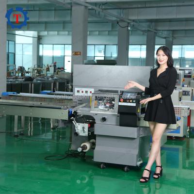 China Vegetable Food Bread Pillow Packing Machine kn 95 Face Mask Packing Machine for sale