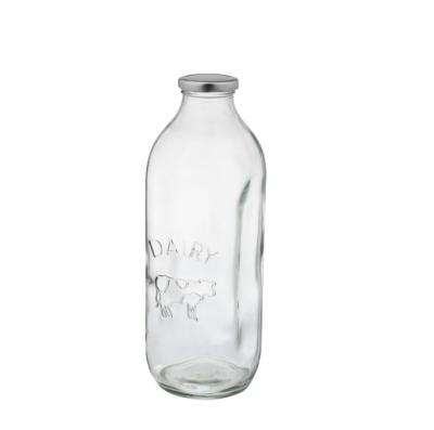 China Freshness Retention Vintage Style Dairy Shop 1 Quart Glass Milk Bottle With Metal Lid for sale