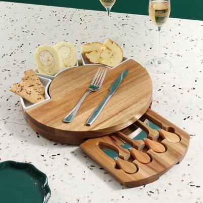 China Sustainable Hot Sale Customized Acacia Chopper Wooden Round Plain Round Bamboo Cheese Board Knife Set for sale