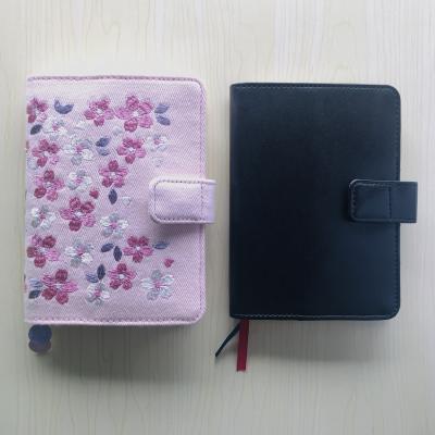 China Hard Cover Book Manufacturers Wholesale Magnetic Clasp Cloth Cover Notebook A5 Custom Notebook for sale