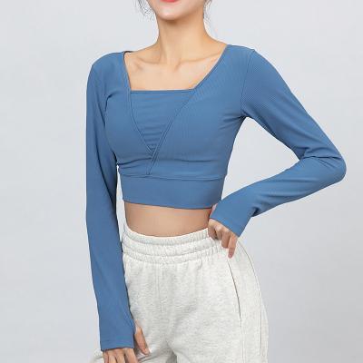 China Breathable Triangle Shape Ribbed Fitness Yoga Shirts Workout Top Women Sport Long Sleeve Crop Tops for sale