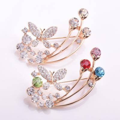 China JAENONES Trendy Factory Fashion Rhinestone Designer Brooches Metal Butterfly Wholesale Flower Brooch For Women for sale