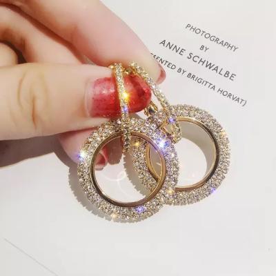 China FASHIONABLE Luxury Gold Full Diamond Round Dangle Hoop Earrings 2021 New Fashion Women's Jewelry Punching Circles Hoop Earrings for sale