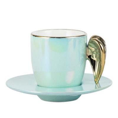 China Sustainable Creative Porcelain Tea Cup And Saucer Set Coffee Set With Wing Handle for sale