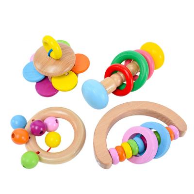 China Early Education Newcomers 2021 Design Toddlers Ratchets Handle Safety Smart Educational Musical Baby Wooden Hand Bell Toy for sale