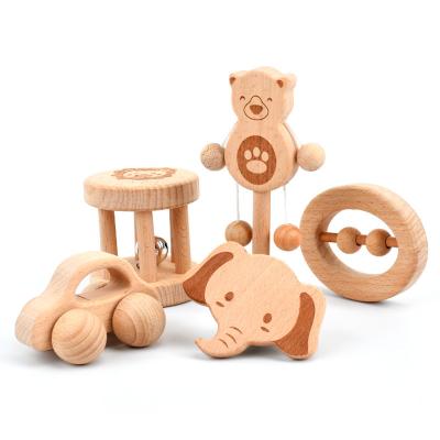 China New Early Education Designer Trendy Custom Fashion Toddler Elephant Waldorf Car Toys OEM Quality Musical Instrument Toys Wooden Baby Rattle for sale