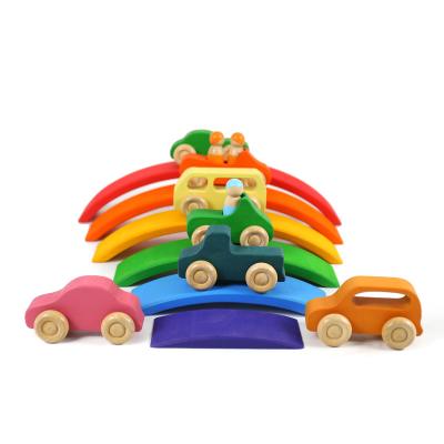 China Eductional preschool toys newest mini wooden cars 7 colors peg doll cars all in one rainbow wooden car for sale