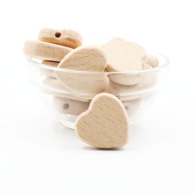 China Eco Friendly BPA Free Wooden Beads Heart Shape Baby Teething Beads for sale