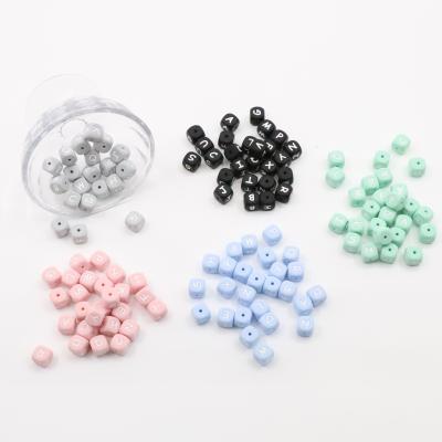 China 100%food grade silicone chewable baby beads eco-friendly black letter loose beads silicone bead for sale