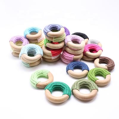 China Eco Friendly Handmade Natural Wooden Baby Chewing Toys Cotton Crochet Teething Ring for sale