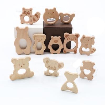 China Beech Wood Teether Baby Sensory Teether Toys Soft BPA Free Bear To Train Baby Wooden Teether for sale