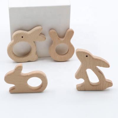 China Wholesale Sensory Baby Bunny Teether Ring Eco Friendly New Design Wooden for sale