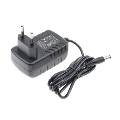 China Interchangeable Mains Connectors Switching Power Supply 12V 2A AC Adapter TPS-1202000zz for sale