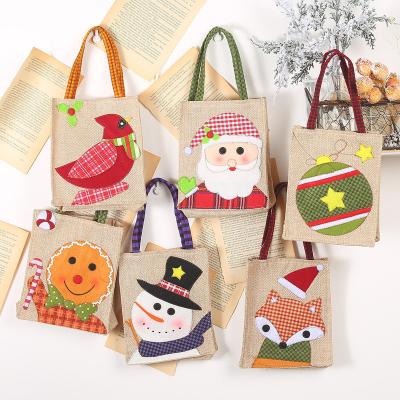 China Eco - Friendly Holiday Wine Bottle Gift Bags Retail Christmas Shopping Packaging Bag With Logo for sale