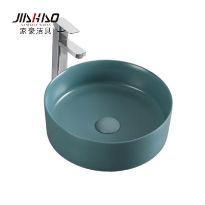 China Bathroom Ceramic Color Art Basin 1189MB Color Bathroom Hardware Round Matte Green Art Basin for sale