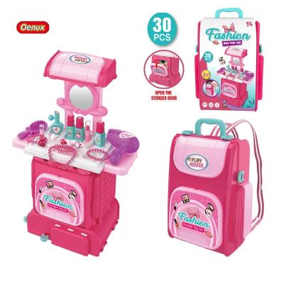 China 2021 fashion backpack children's makeup kit toys children's electronic dressing table toys for simulation toys for sale