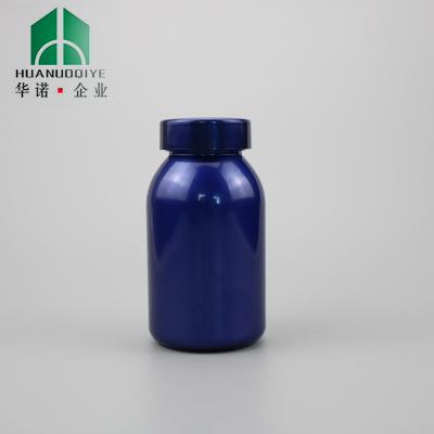 China Dark Blue Oral Medicine 230cc Pet Solid Round Plastic Bottles With Pill And Capsule for sale