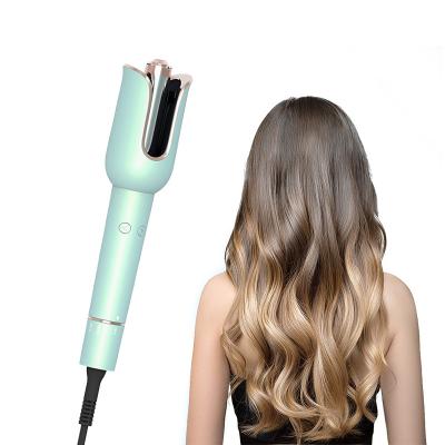 China Magic Automatic Negative Hair Curler Best PTC Heater Auto Rotating Hair Curling Professional Ceramic Iron Automatic Hair Curler for sale