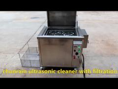 Ultrasonic cleaner with filter