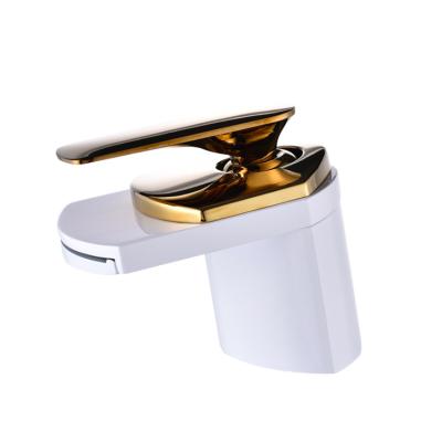 China Wenzhou Factory Chrome Basin Faucet Waterfall Bathroom High Quality Wholesale Modern Brass Single Level Short Basin Mixer Tap for sale