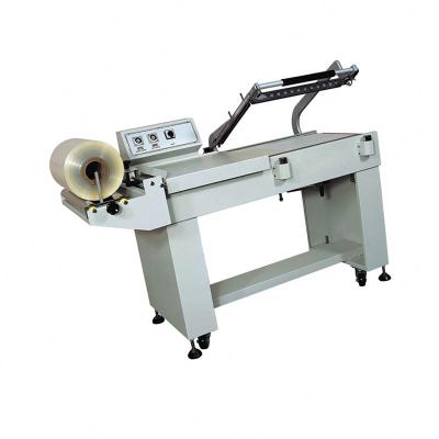 China Semi-automatic food shrink shrink paper wrapping machine for sale perfume boxes book for sale