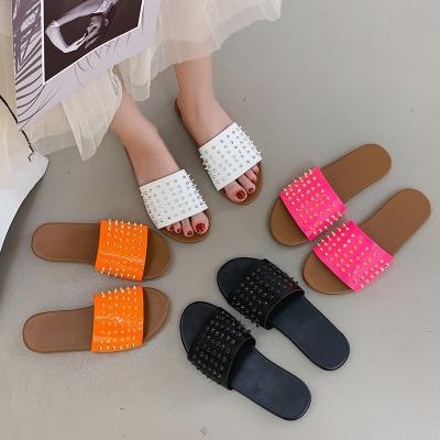 China Fashion Trend Ladies High Quality Rivet Slides Slippers For Shoes Flat Custom Slippers Women Sandals Wholesale Slippers for sale