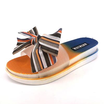 China CUSHIONING Custom Jelly Slipper Latest Fashion Colorful Bow Women's Thick Jelly Slipper Unique Custom Slippers For Ladies Sandals Beach Slides for sale