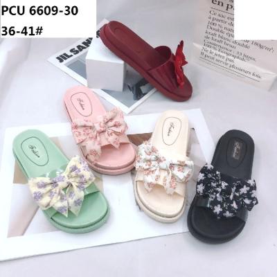 China CUSHIONING Fashion Cute Bow Flat Slippers For Women Indoor Outdoor Flat Slippers Custom Color Beach Slippers for sale