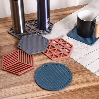 China Solid Color Tea Coaster Solid Color Non-slip Thermal Insulation Nordic Hollow Viable Silicone High Temperature Resistant Anti-scald Bowl Mat for sale