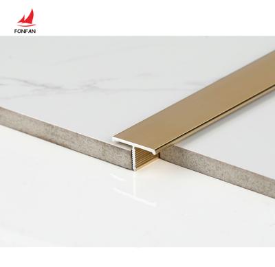 China Modern Trim T Shape Aluminum Profile Matte Titanium Transition Strips Tiles Flooring Accessories for sale