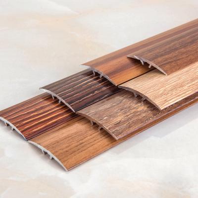 China Modern Wood Effect Tile Trims Aluminum Floor Trim Transition Metal Strips for sale