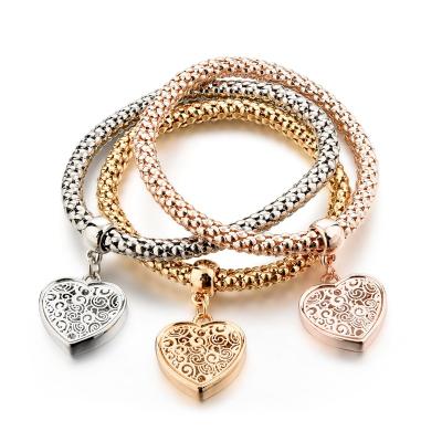 China New rubber bands arrive heart shape gold bangle, women bangle set, bangle charm for sale