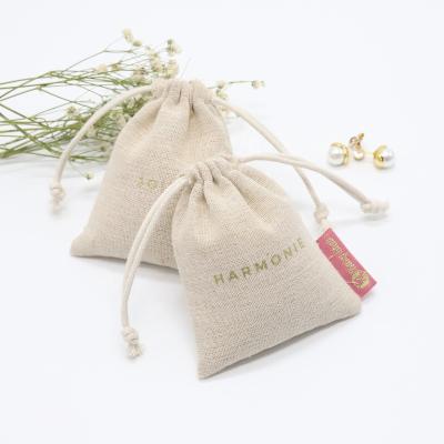 China Natural Logo Linen Burlap Gift Jewelry Golden Logo Pouch Eco-friendly Jute Christmas Party Wedding Favor Gift Bag Pouch Soft Eco-Friendly for sale