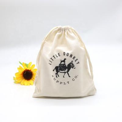 China Eco Personalized Eco-Friendly Cream Fabric Gift Bag Promotional Canvas Drawstring Bag With Logo for sale