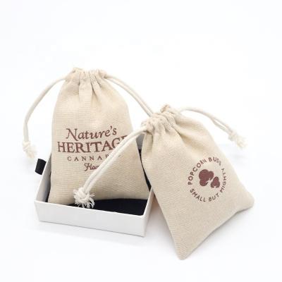 China Logo Slogan Printed Natural Jute Small Drawstring Bag Cloth Pouch Jute Eco Soft Canvas Bag for sale