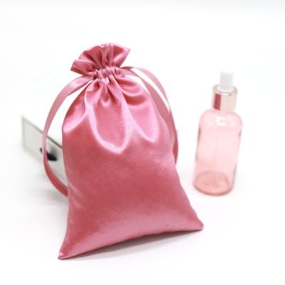 China Soft Small Simple Drawstring Bag Rose Jewelry Satin Cosmetic Perfume Pouch for sale