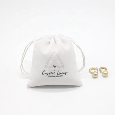 China Recyclable White Small Gift Watch Pouch Velvet Crystals Agates Jewelry Packaging Bag With Custom Logo for sale