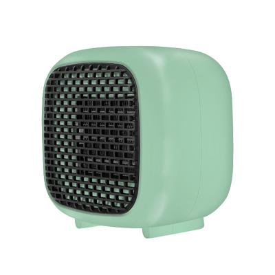 China Mini Size ZY-8800 Mini Portable PTC Air Room Space Fan Portable Ceramic Heater Electric Heater Home Air Conditioner for sale